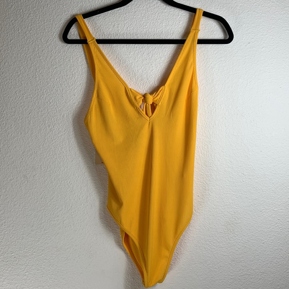 Yellow ribbed swimsuit with snap underwear, size medium, excellent condition